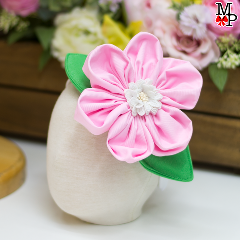 Accesorio para la cabeza, flor rosada con hojas