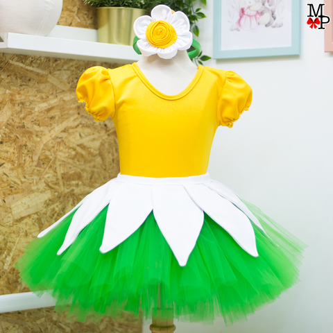 Set de tutu inspirado en flor margarita, incluye leotardo, falda tutu, accesorio de la cabeza y detalle de hojas para la cintura. Tallas desde 12 meses hasta #14